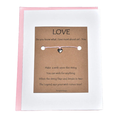 Card with a heart-shaped pendant and text on a white background